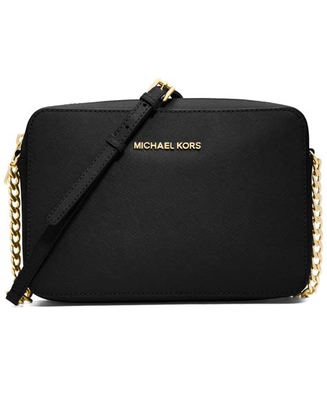 michael kors jet set travel crossgrain black and gold|Michael Kors flight crossbody bag.